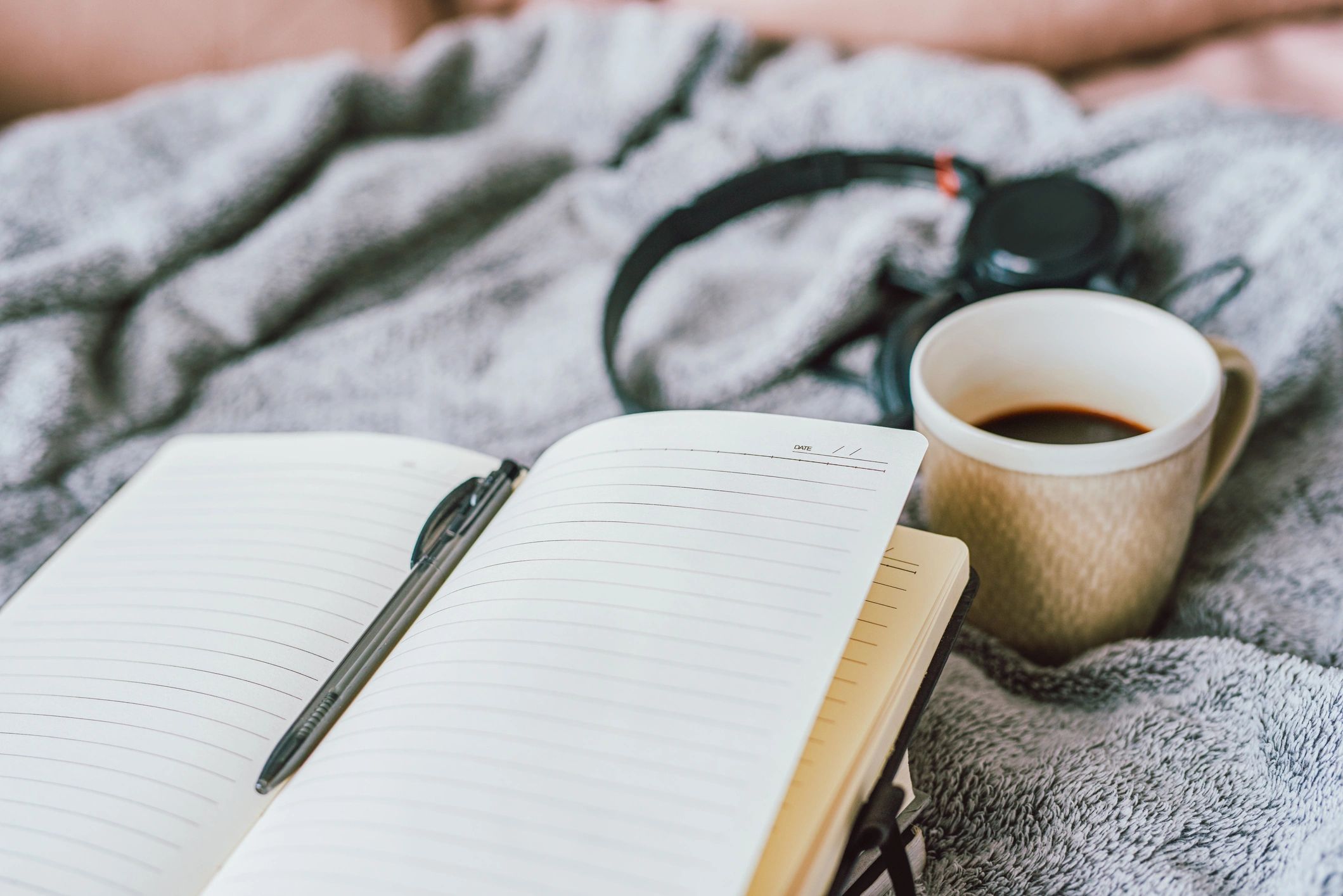 Notebook and coffee setup for writing content
